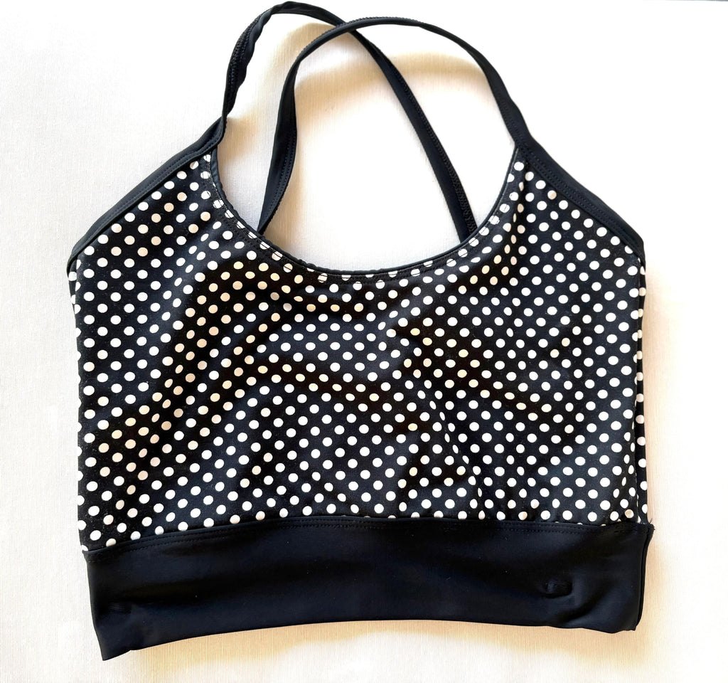 Peto negro con lunares