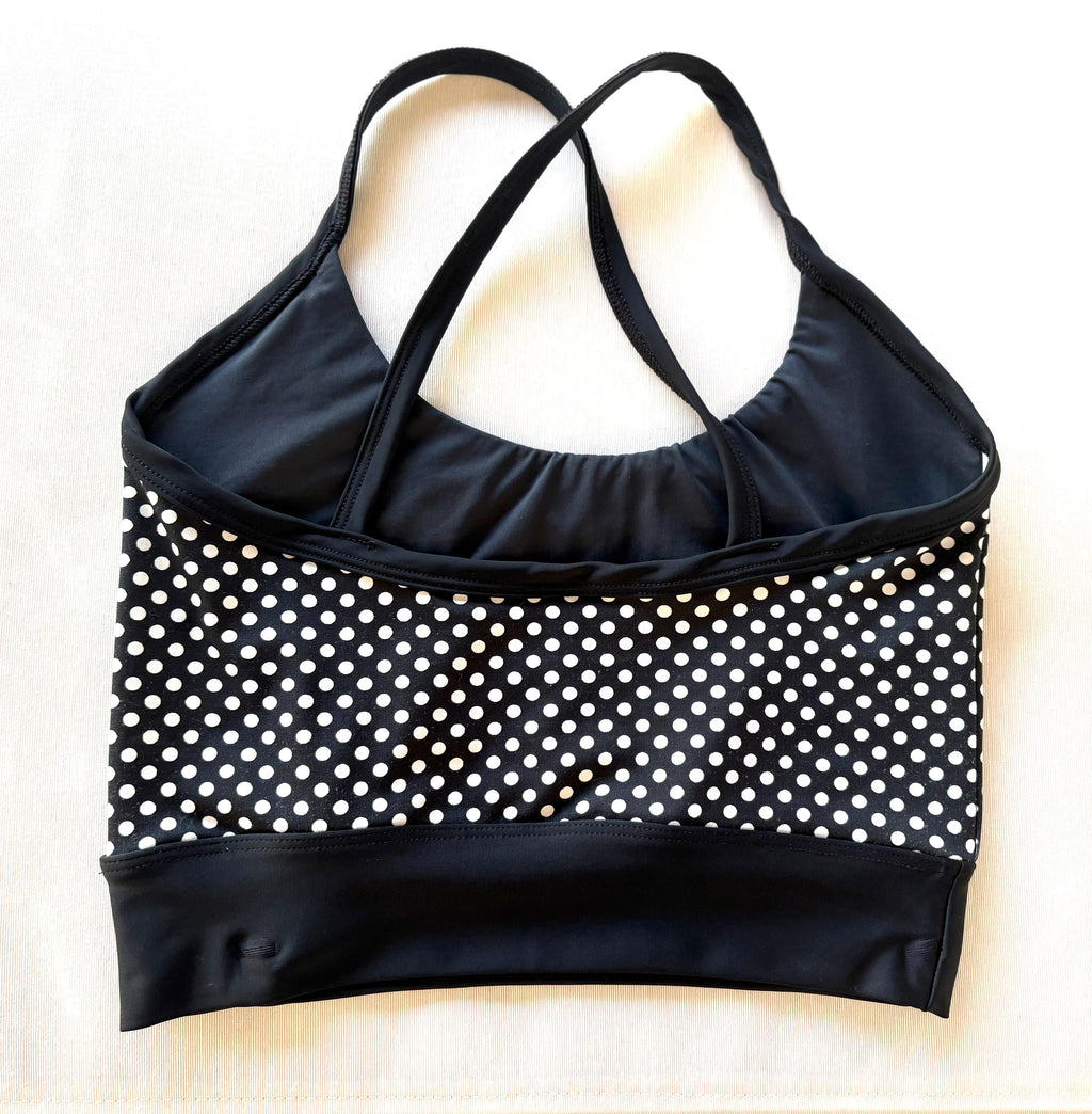 Peto negro con lunares