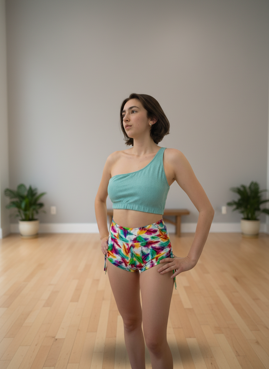 3. short plumas ajustable
